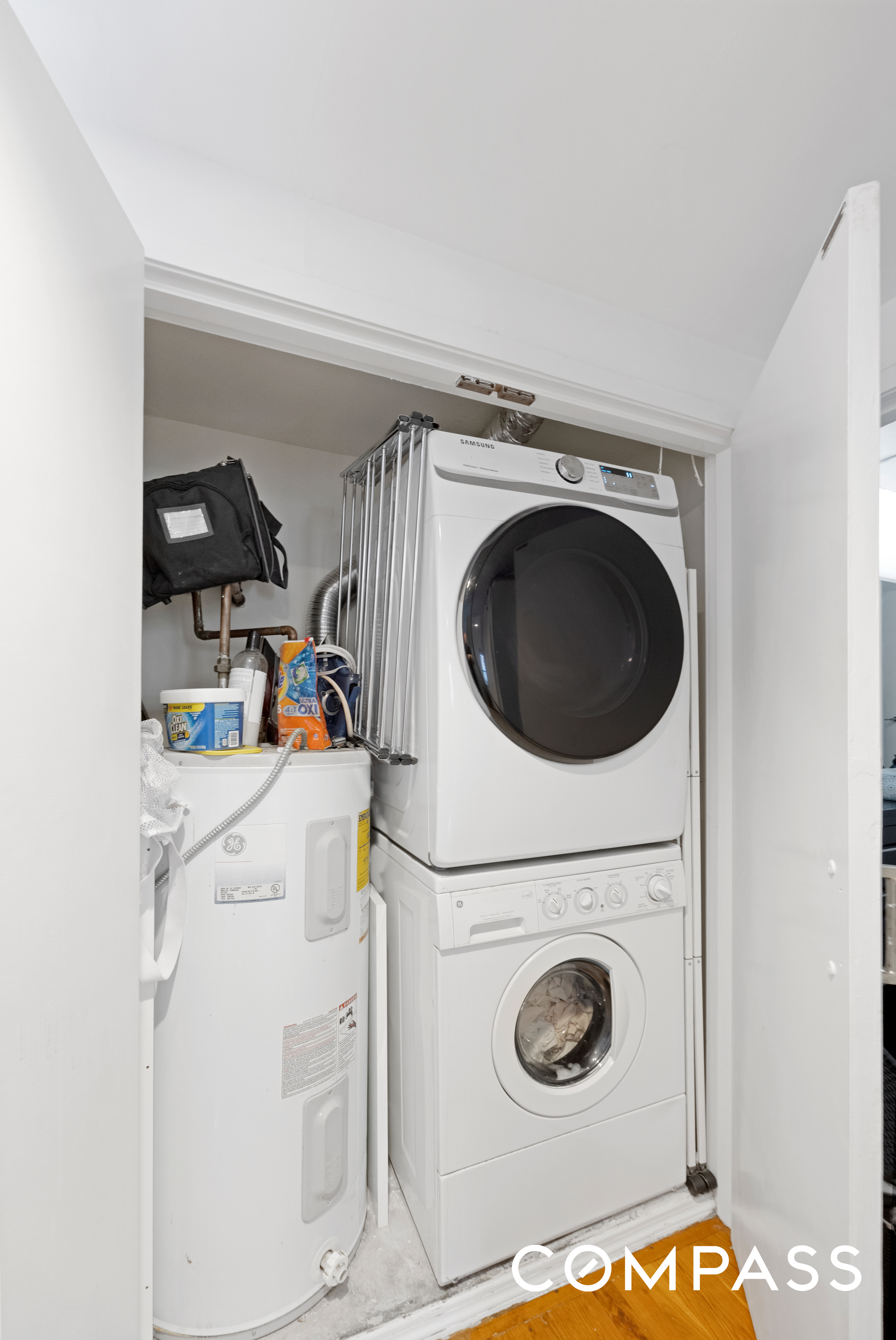 152 East 74th Street, Unit 2 Manhattan, NY 10021 - Photo 10 of 16 a utility room with dryer and washer