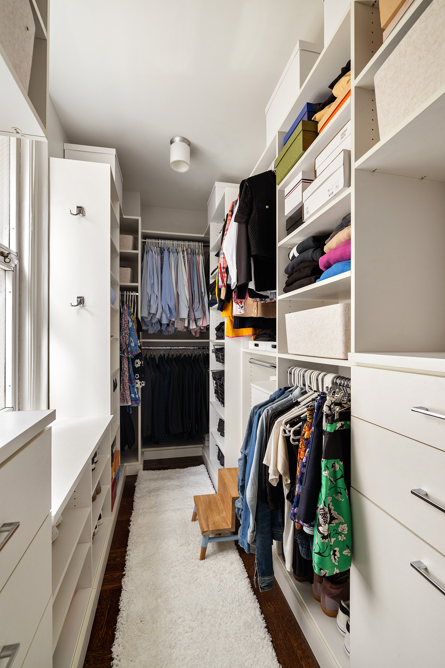 201 West 89th Street, Unit 2F Manhattan, NY 10024 - Photo 6 of 20 a view of walk in closet with clothes and shoes