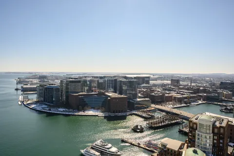 a view of a lake with a city