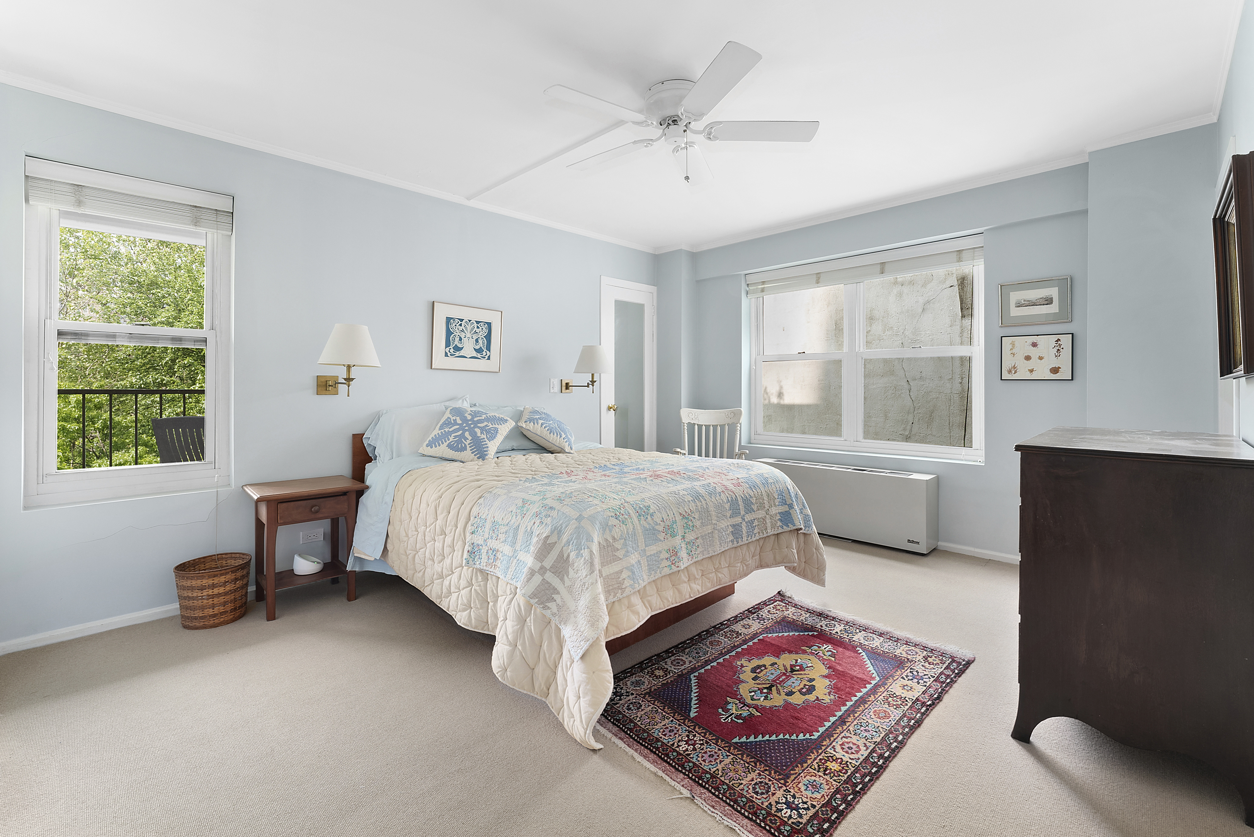 2 5th Avenue, Unit 55 Manhattan, NY 10011 - Photo 11 of 20 a bedroom with a bed dresser and a window