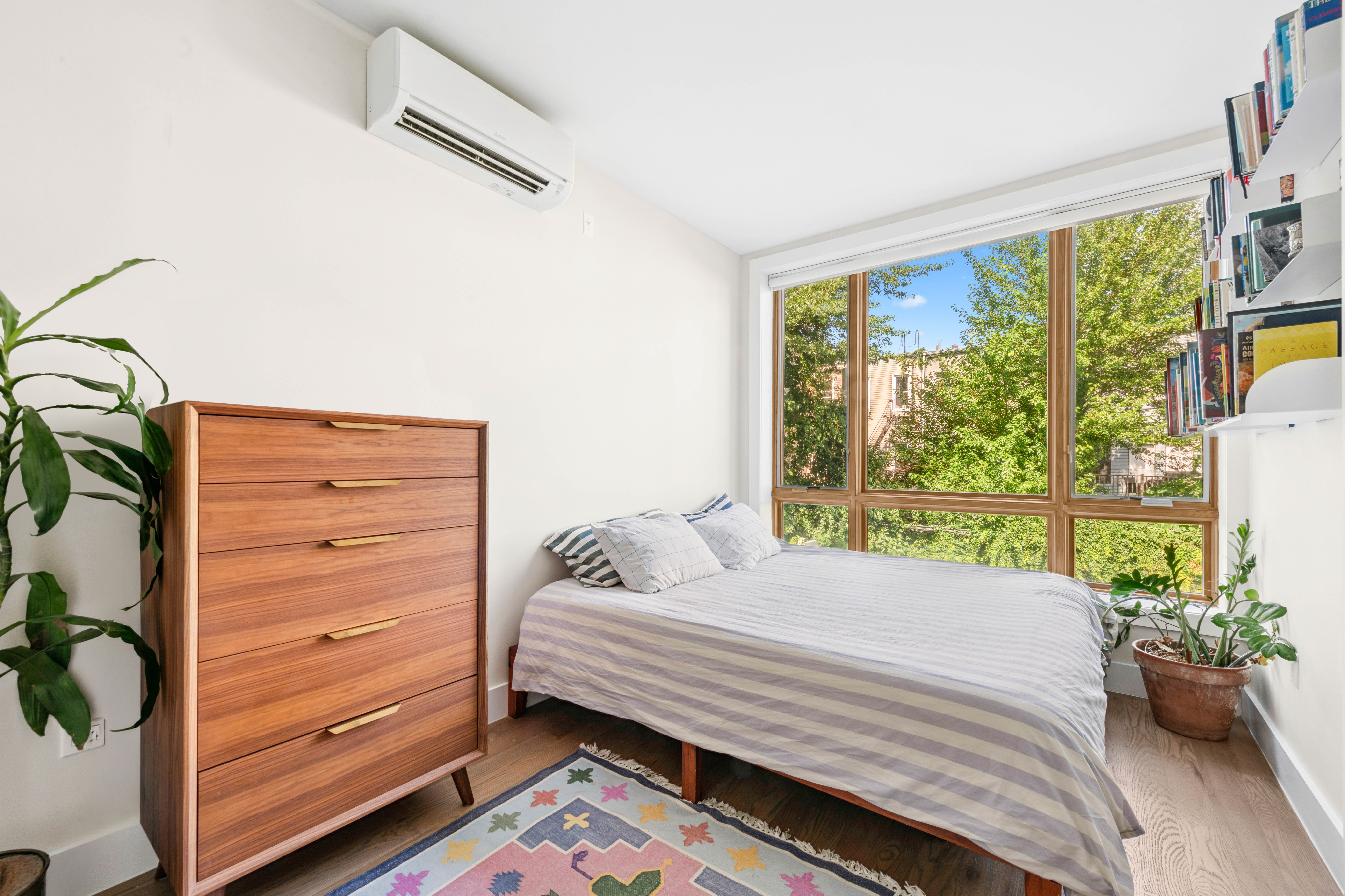 1189 Jefferson Avenue, Unit 2 Brooklyn, NY 11221 - Photo 6 of 10 a bedroom with a bed and a window