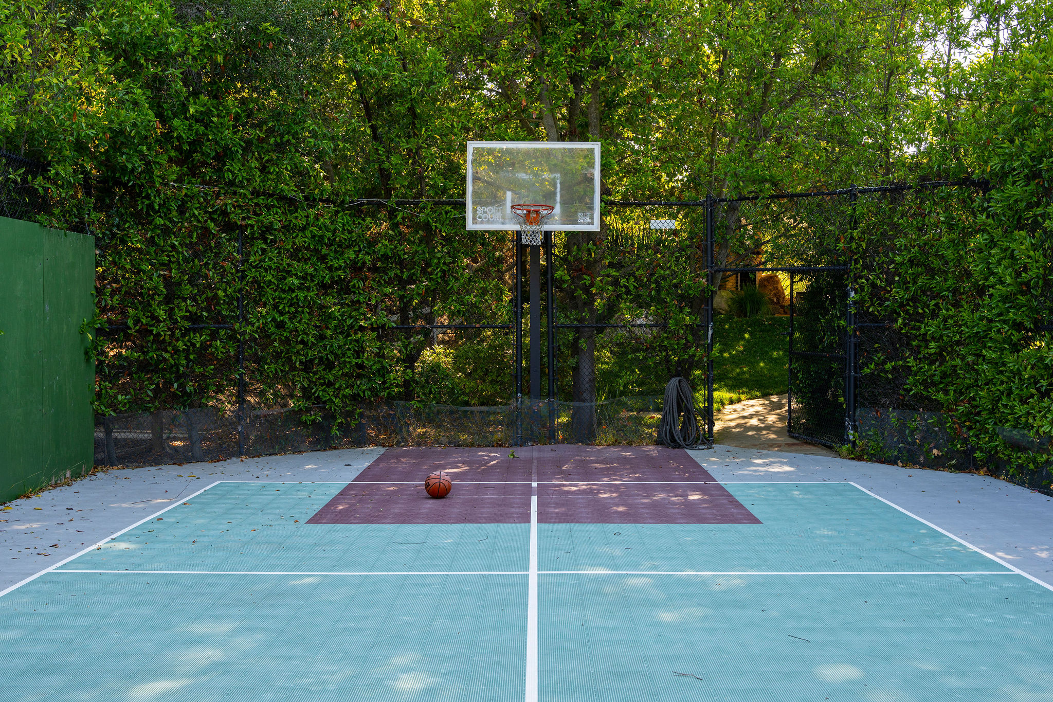 560 Cold Canyon Road Calabasas, CA 91302 - Photo 73 of 84 a backyard of a house with lots of green space and trees