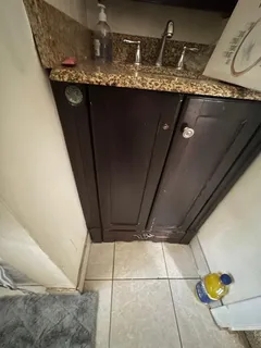 a room with furniture and flat screen tv