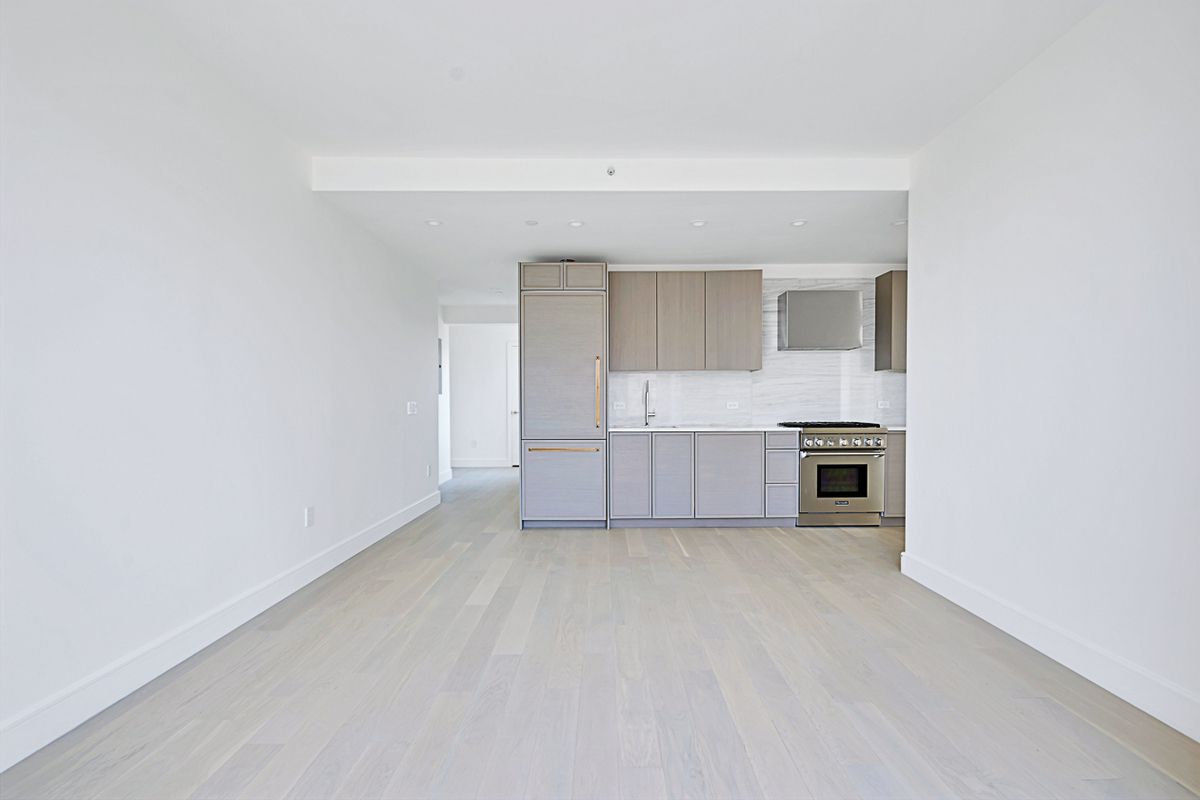 1399 Park Avenue, Unit 7B Manhattan, NY 10029 - Photo 3 of 14 a view of a kitchen with a sink