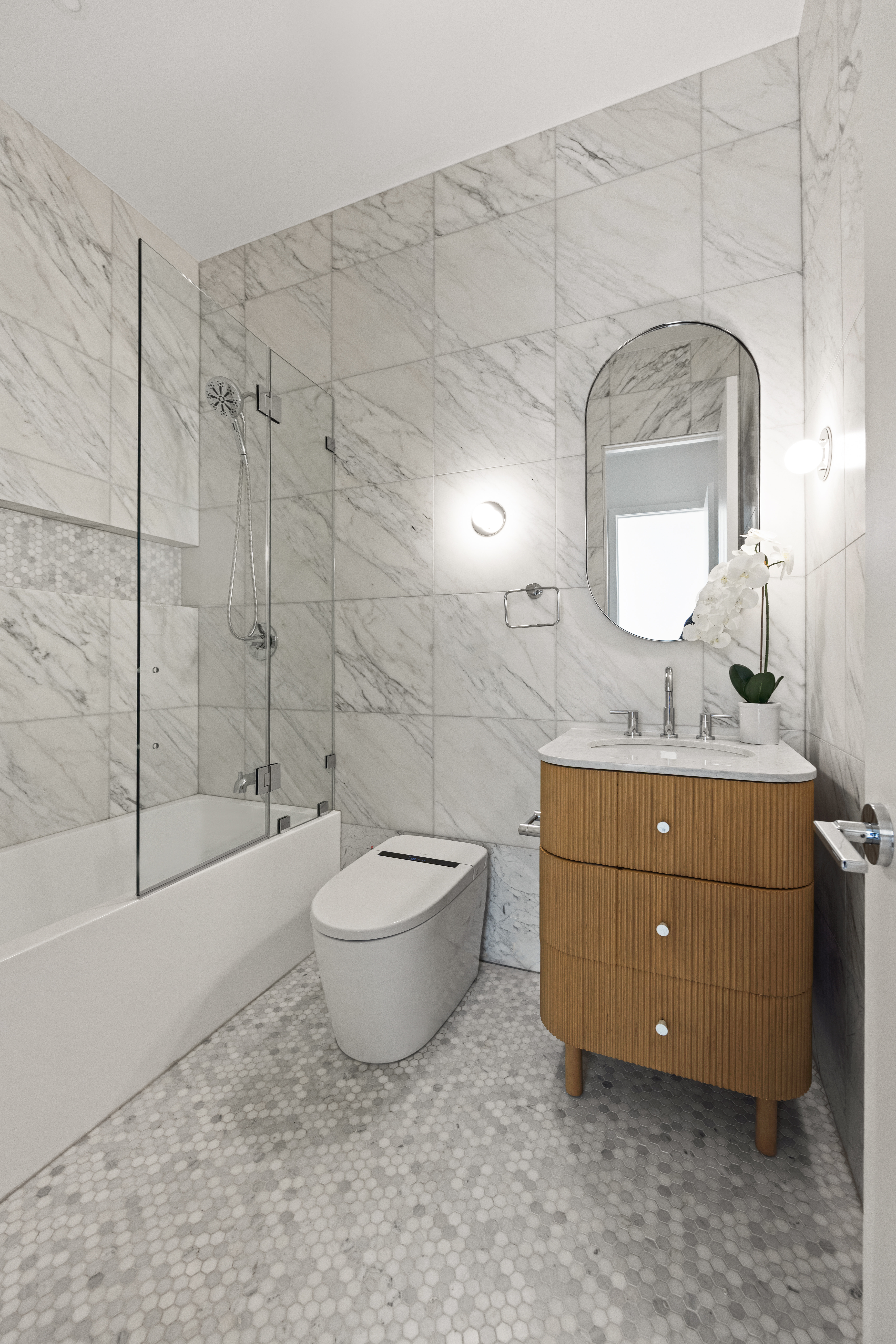 737 Decatur Street Brooklyn, NY 11233 - Photo 17 of 19 a bathroom with a toilet a sink and bathtub