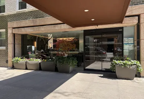 a view of a chairs and tables in patio