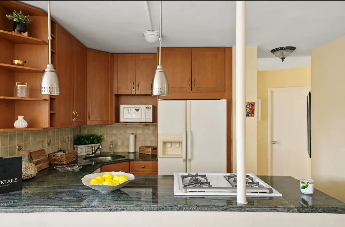 a view of a living room and bathroom
