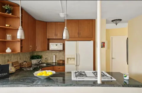 a view of a living room and bathroom