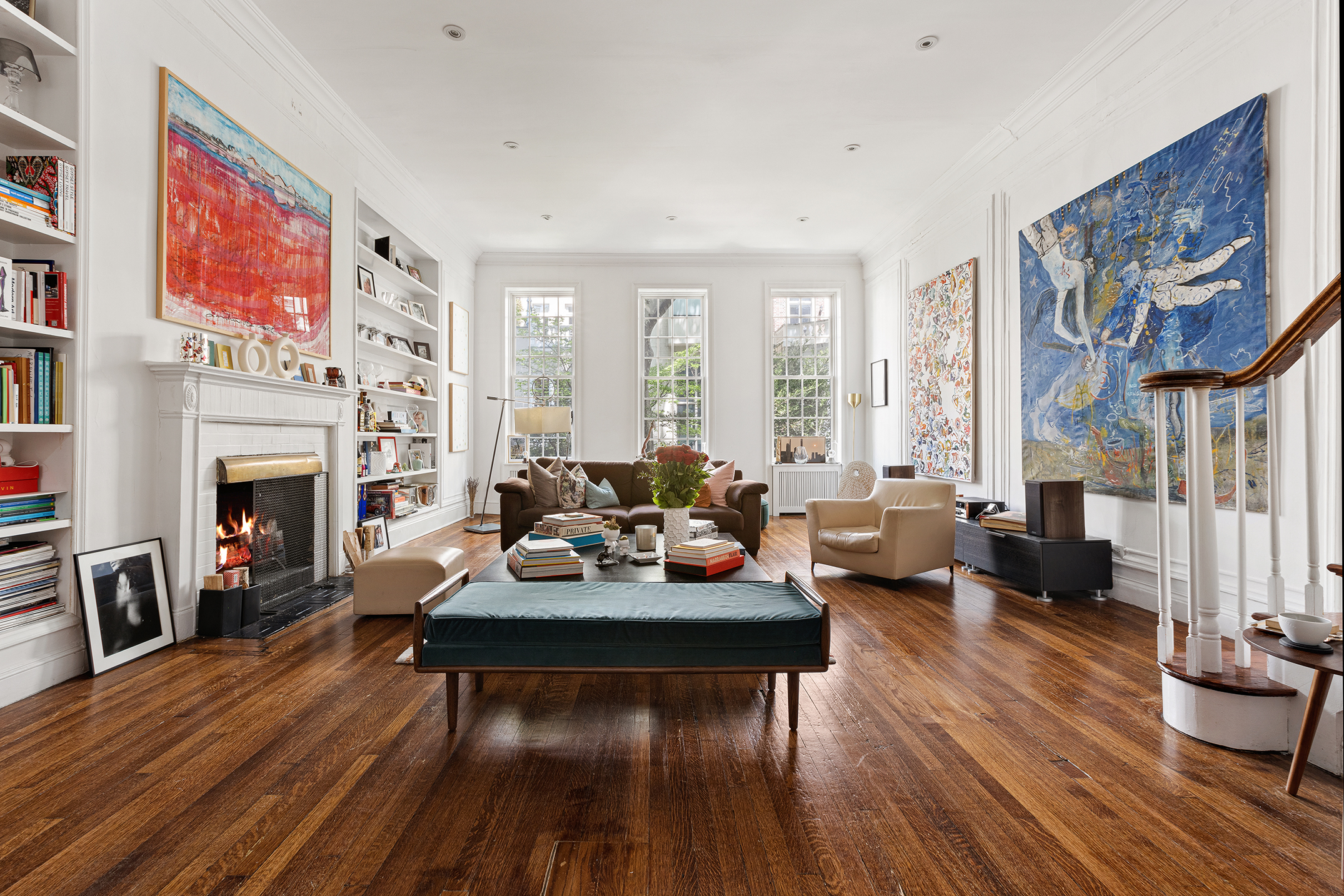 159 East 63rd Street, Unit 2/3 Manhattan, NY 10065 - Photo 2 of 13 a living room with furniture fireplace and window