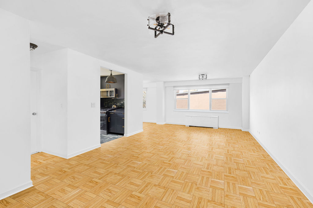 101 West 12th Street, Unit 5V Manhattan, NY 10011 - Photo 17 of 26 a view of an empty room with closet