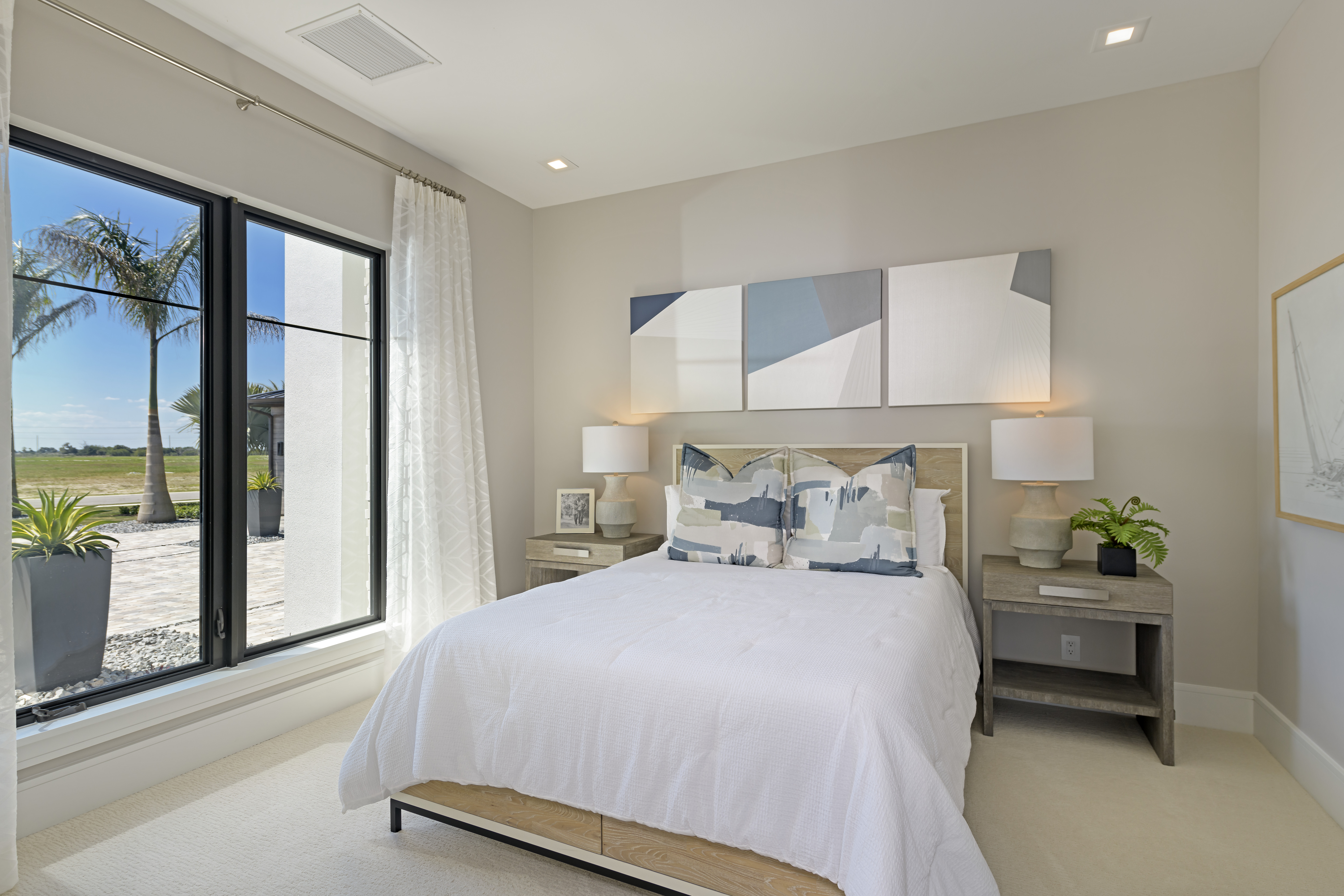 Address Upon Request Rockledge, FL 32955 - Photo 18 of 28 a bedroom with a large bed and a potted plant