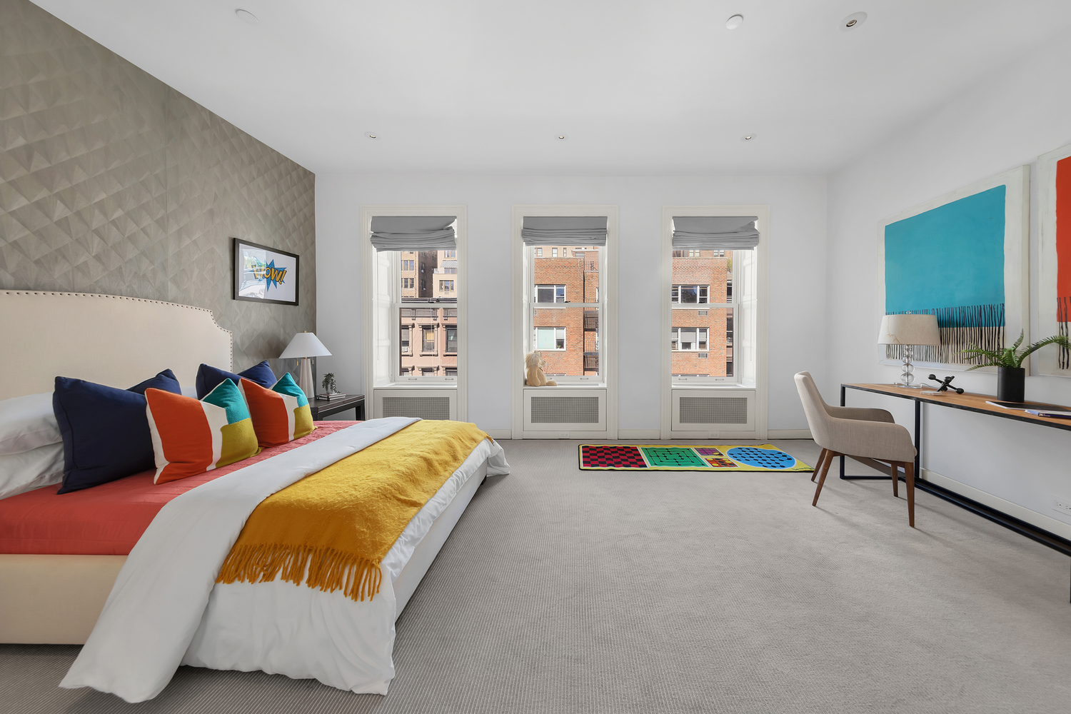 42 West 71st Street Manhattan, NY 10023 - Photo 26 of 35 a bedroom with a bed chair and a large window