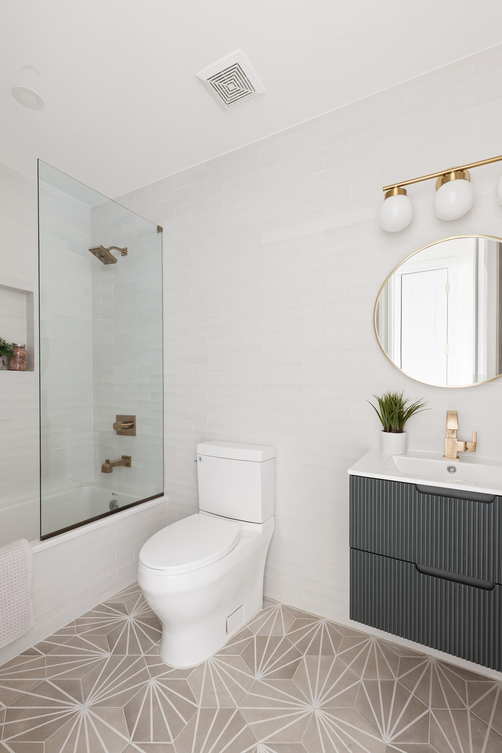 728 Westminster Road Brooklyn, NY 11230 - Photo 15 of 23 a bathroom with a toilet a sink and shower