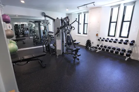 a view of a room with gym equipment