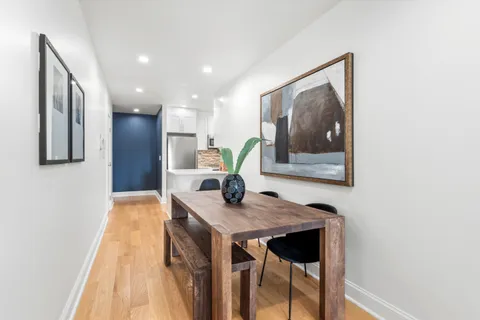 a view of a workspace with furniture