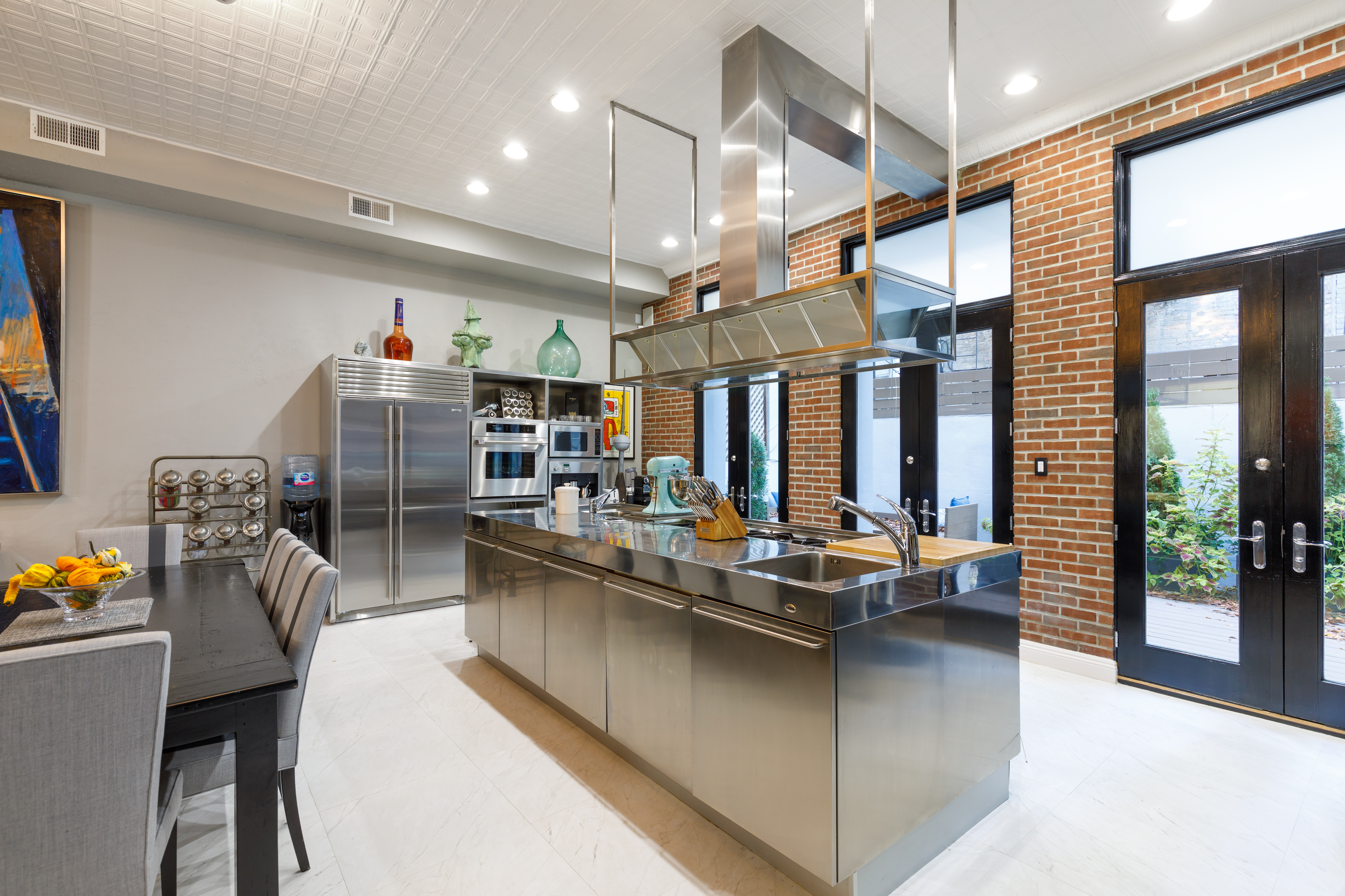 4 Centre Market Place Manhattan, NY 10013 - Photo 2 of 15 a living room with furniture kitchen view and a large window