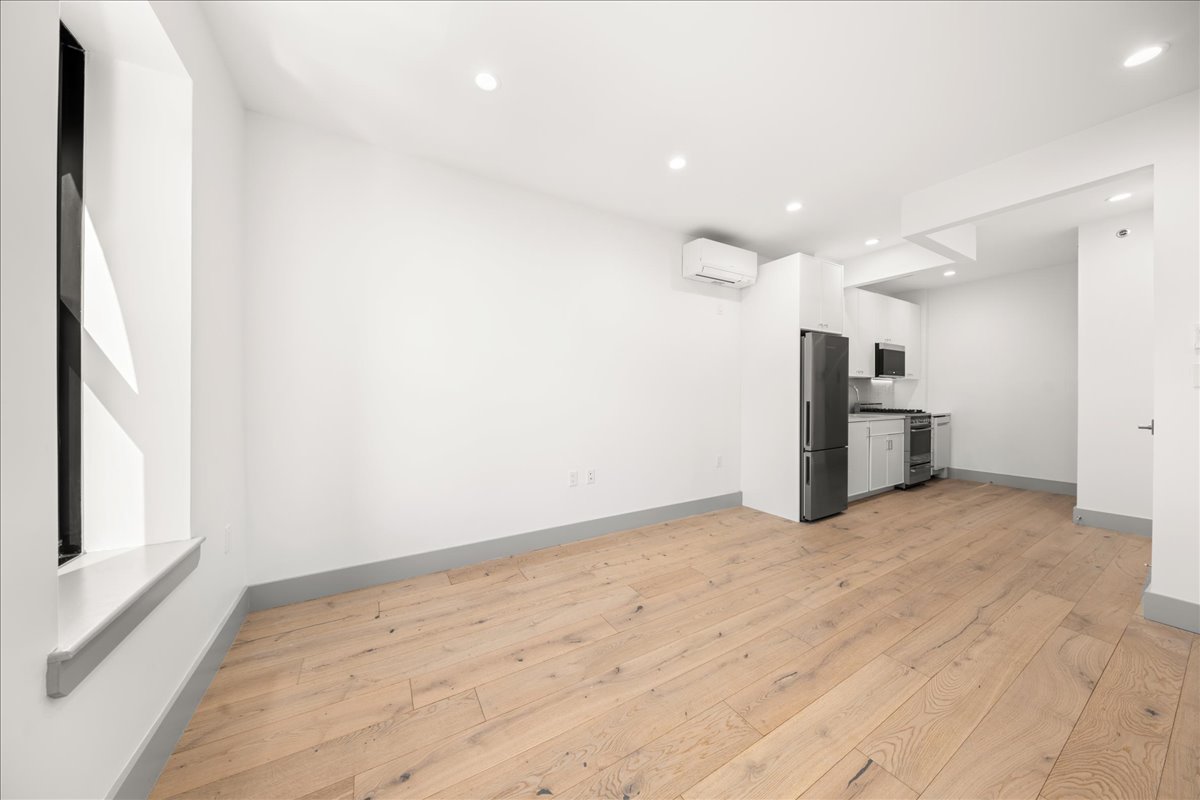 463 West 142nd Street, Unit 4B Manhattan, NY 10031 - Photo 2 of 10 a view of an empty room with a window