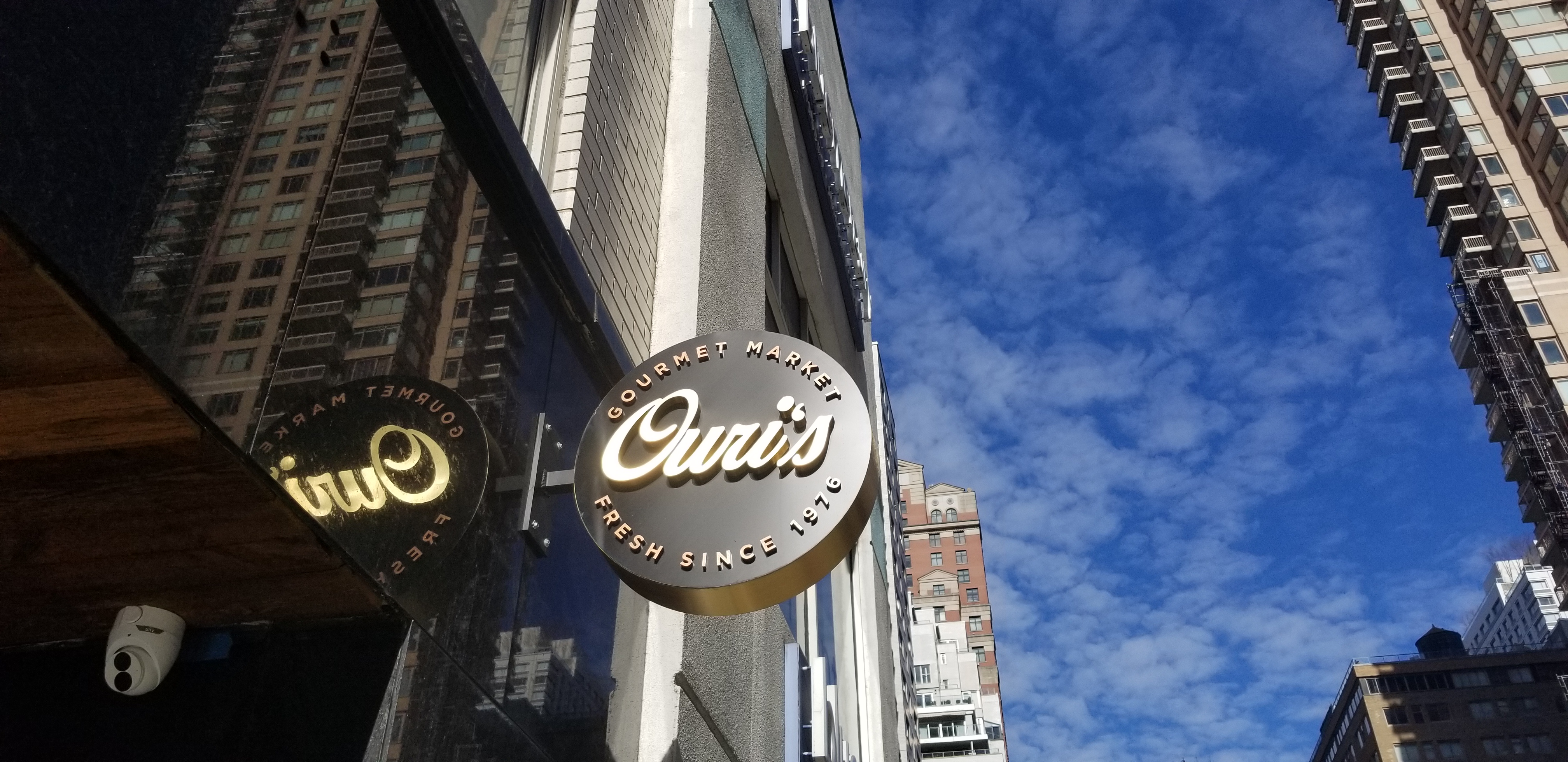 200 East 66th Street, Unit D1205 Manhattan, NY 10065 - Photo 29 of 33 a view of a entryway door with wooden floor