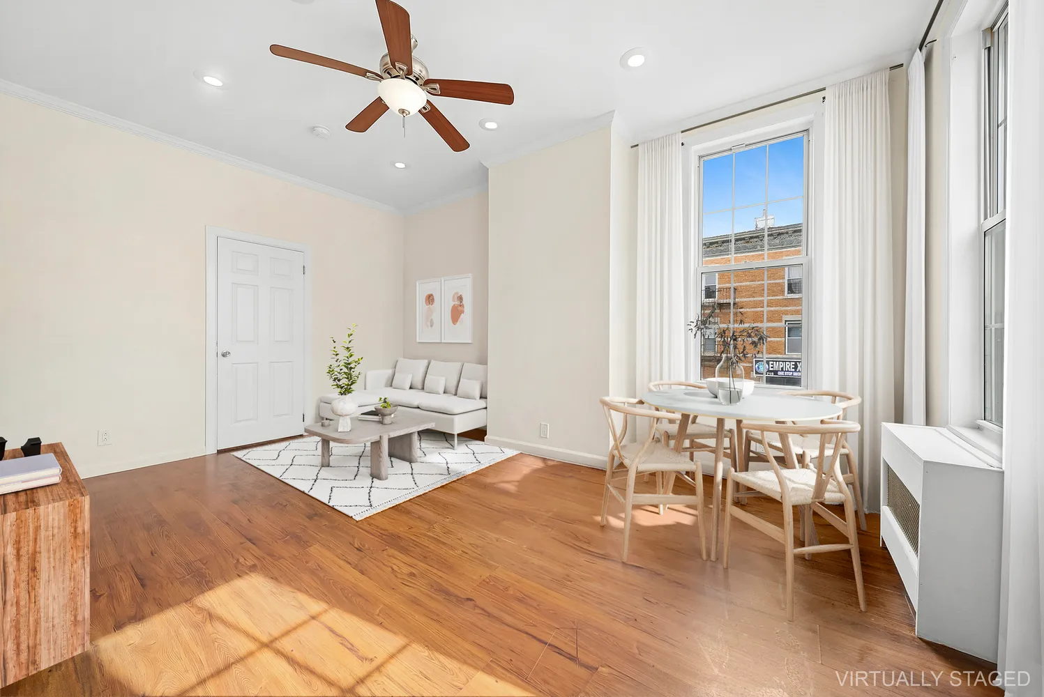 a living room with furniture and a window