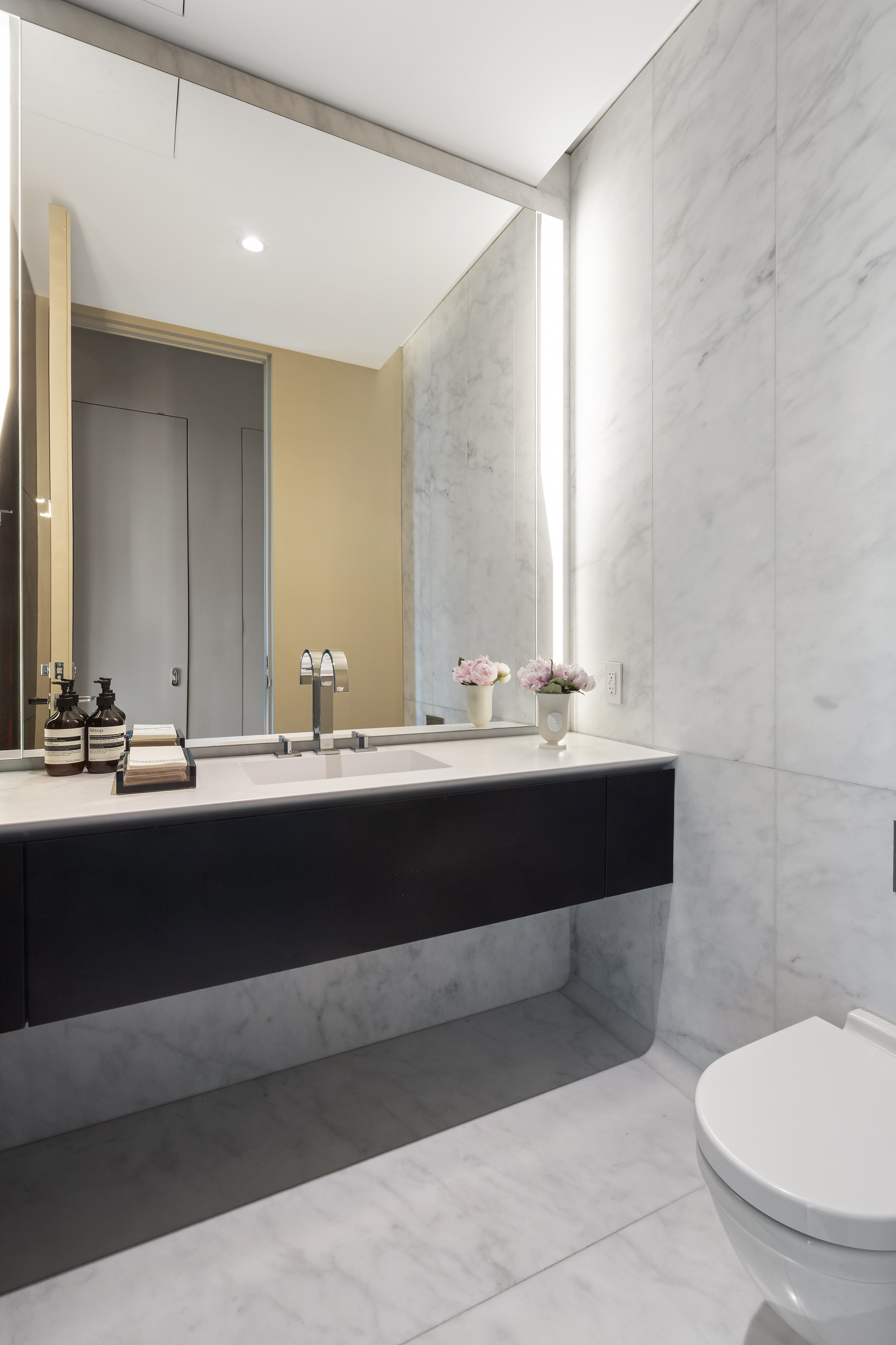 520 West 28th Street, Unit PH37 Manhattan, NY 10001 - Photo 38 of 45 a bathroom with a sink and a toilet