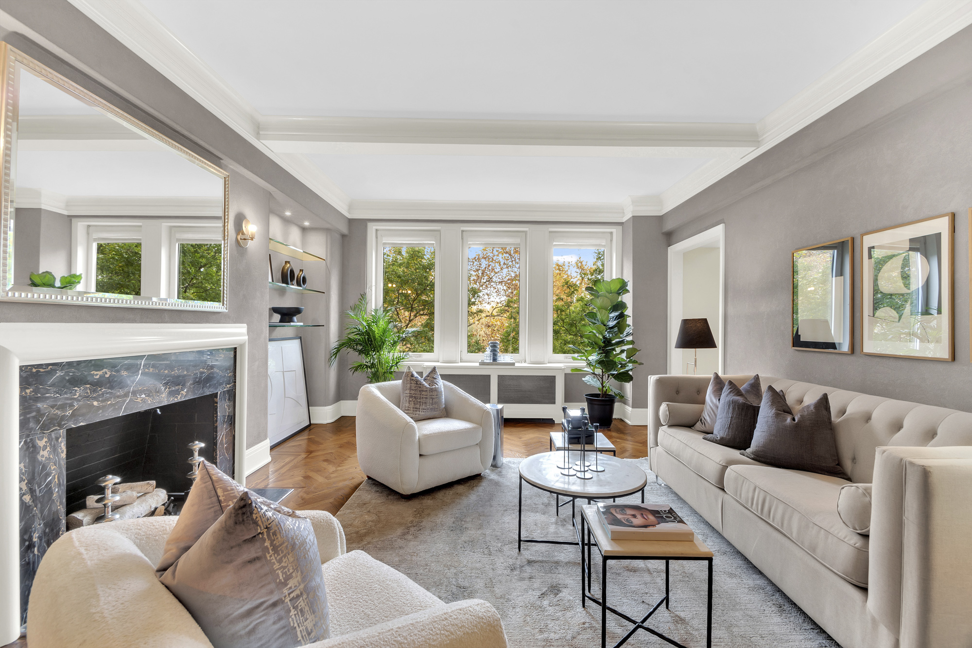 7 Gracie Square, Unit 5A Manhattan, NY 10128 - Photo 2 of 26 a living room with furniture and a fireplace