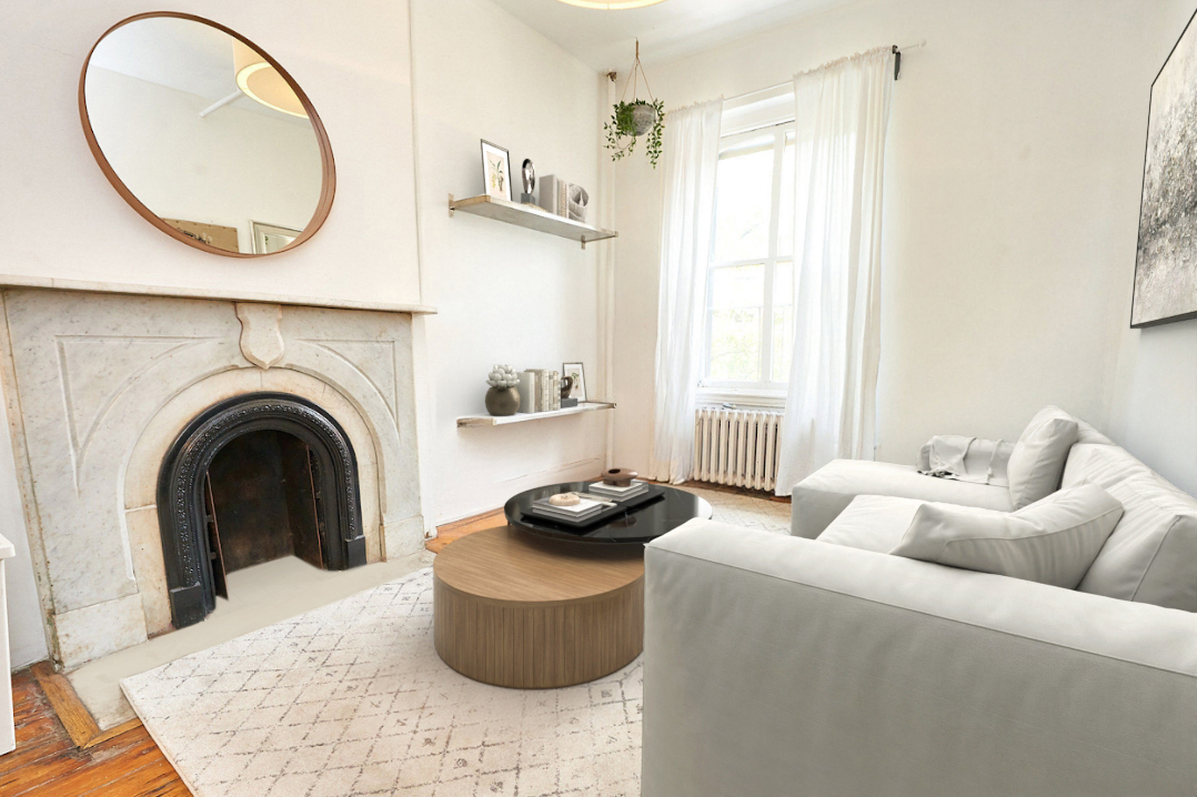 120 East 10th Street Manhattan, NY 10003 - Photo 11 of 23 a living room with furniture and a fireplace