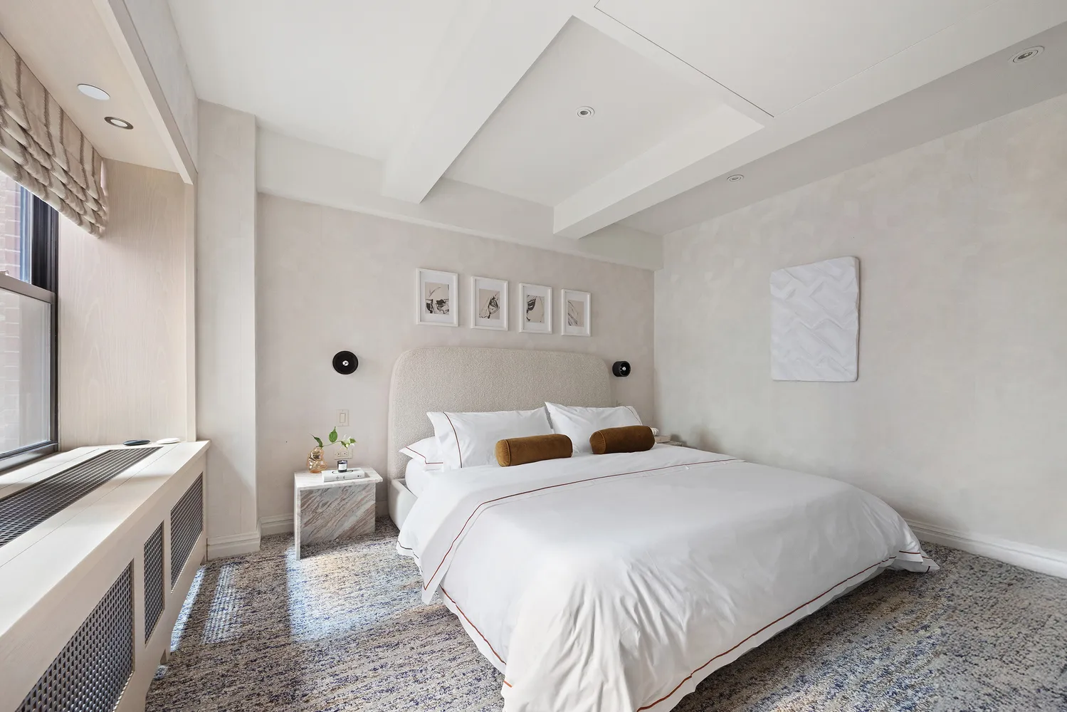 a bedroom with a bed and a cabinets