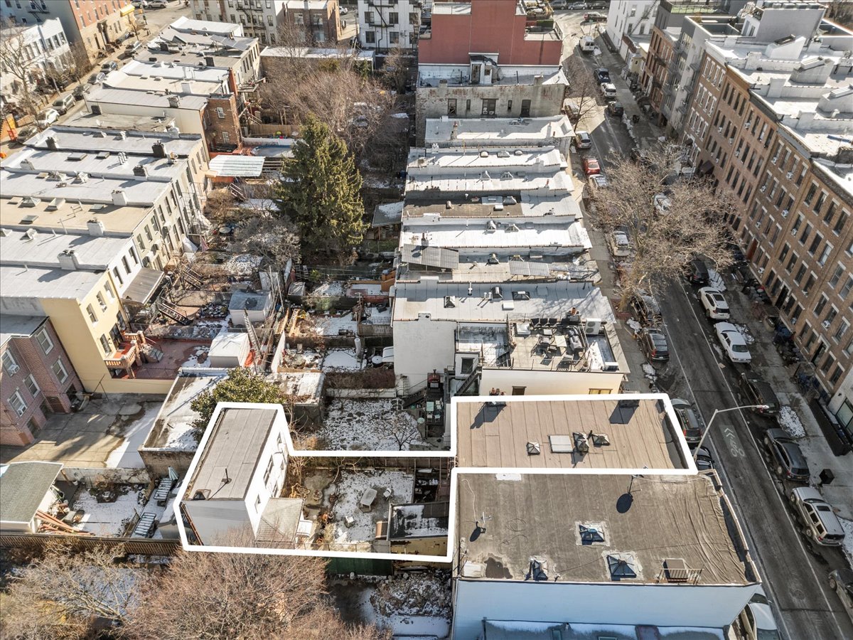335 21st Street Brooklyn, NY 11215 - Photo 4 of 11 an aerial view of multi story residential apartment building with yard