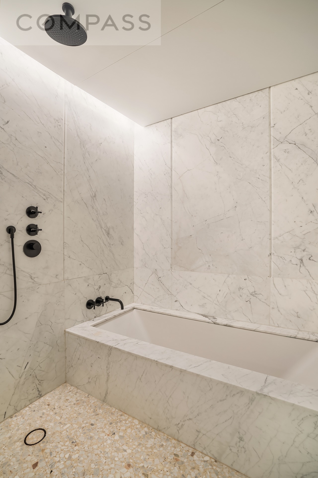 16 West 40th Street, Unit 21B Manhattan, NY 10018 - Photo 15 of 18 a bathroom with a bathtub and a shower