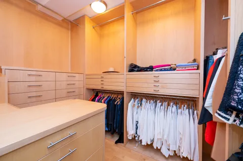 a view of a livingroom with furniture and a flat screen tv