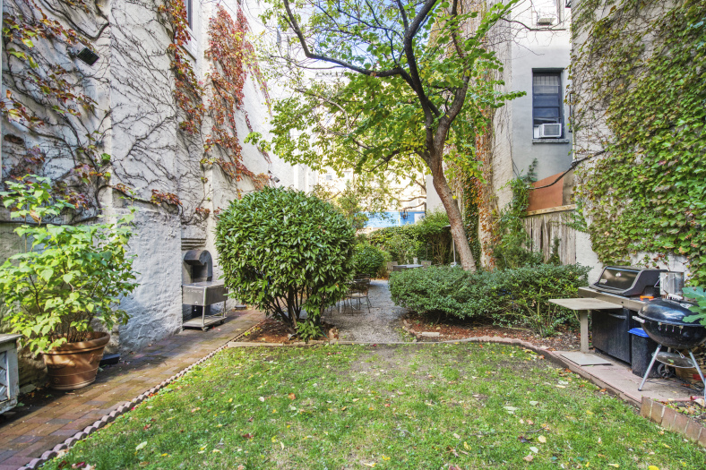 72 East 3rd Street, Unit 5A Manhattan, NY 10003 - Photo 11 of 16 a view of backyard with outdoor seating and green space