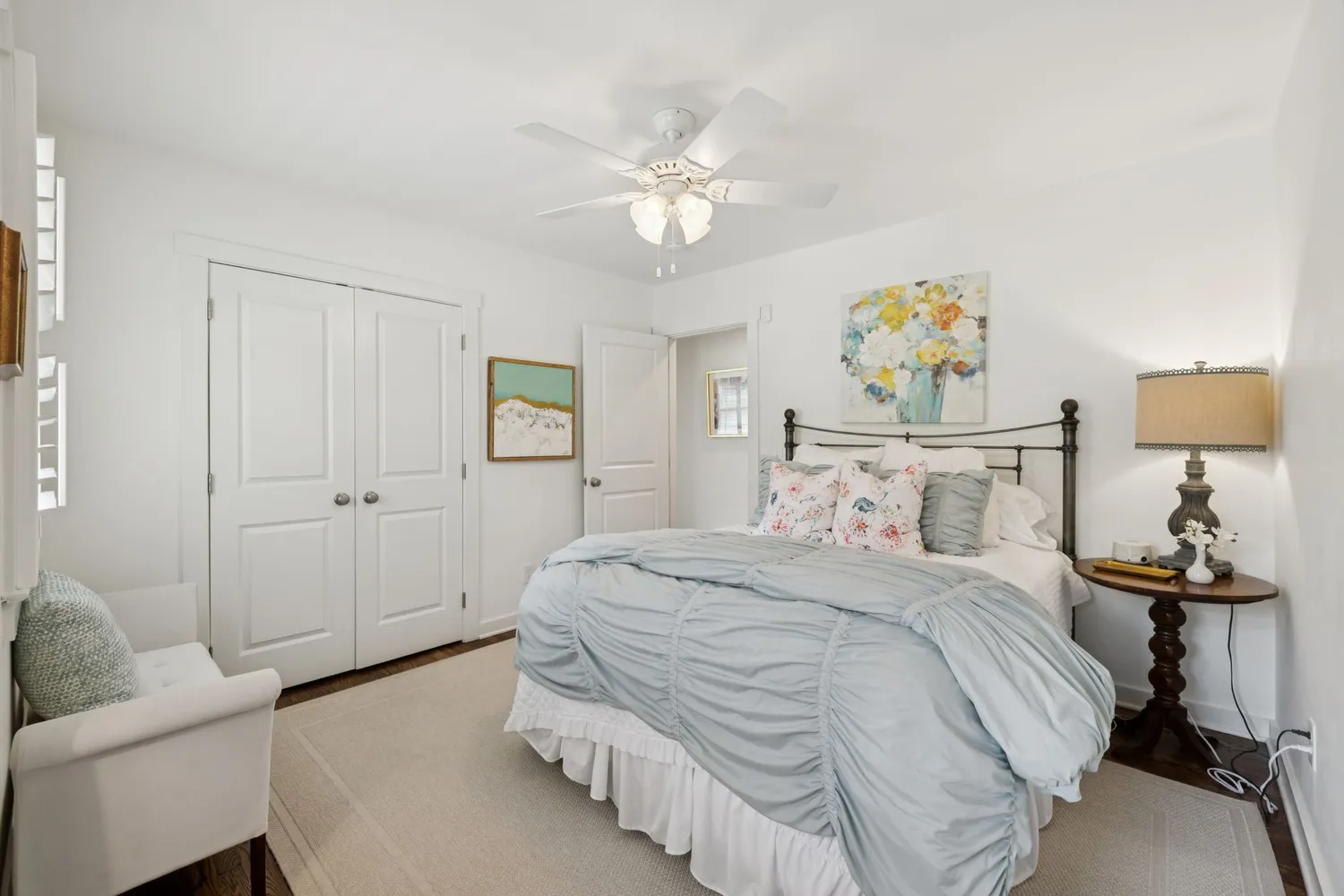 a bedroom with a bed furniture and a window