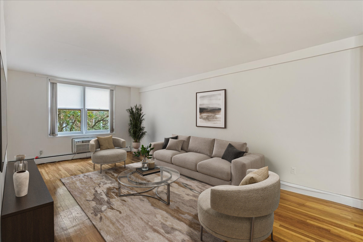 54-44 Little Neck Parkway, Unit 5G Queens, NY 11362 - Photo 3 of 20 a living room with furniture and a window