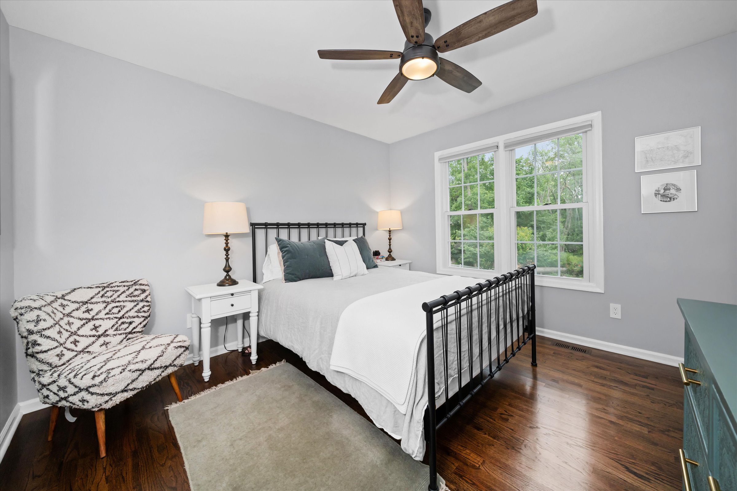 Address Upon Request West Chester, PA 19382 - Photo 39 of 76 a bedroom with a bed a chandelier and a window