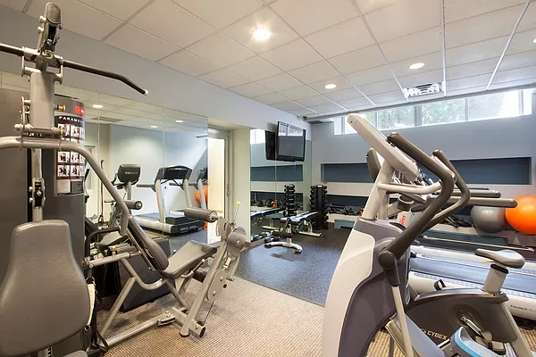 301 West 118th Street, Unit 10G Manhattan, NY 10026 - Photo 14 of 17 a view of a room with gym equipment