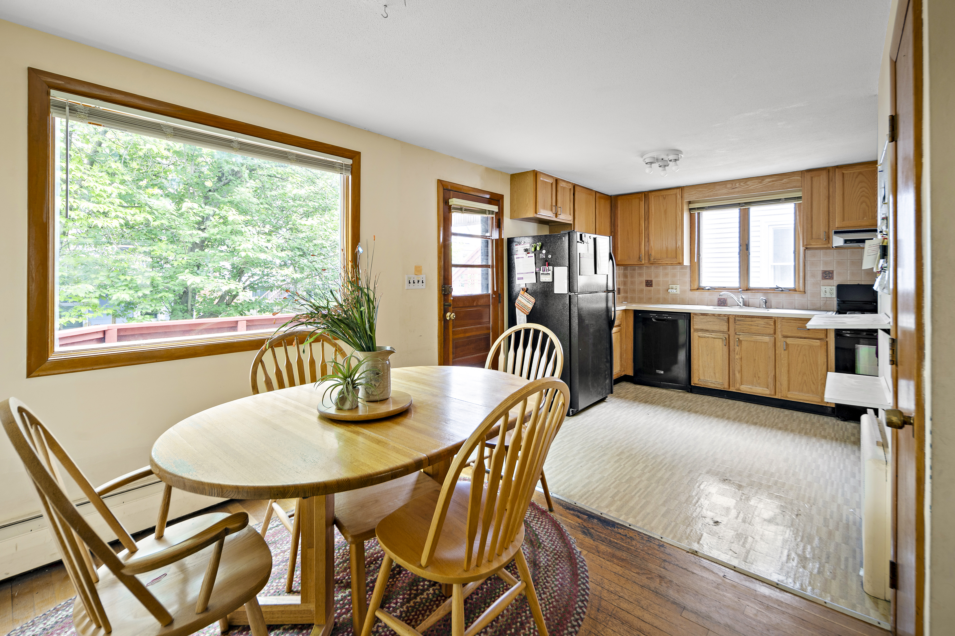 15 Harrington Road Cambridge, MA 02140 - Photo 4 of 17 a view of a dining room with furniture and a window