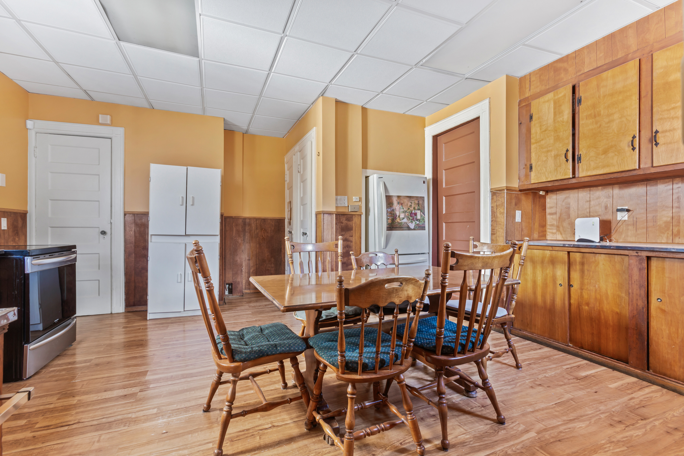 686 Rugby Road Brooklyn, NY 11230 - Photo 6 of 18 a dining room with furniture and wooden floor