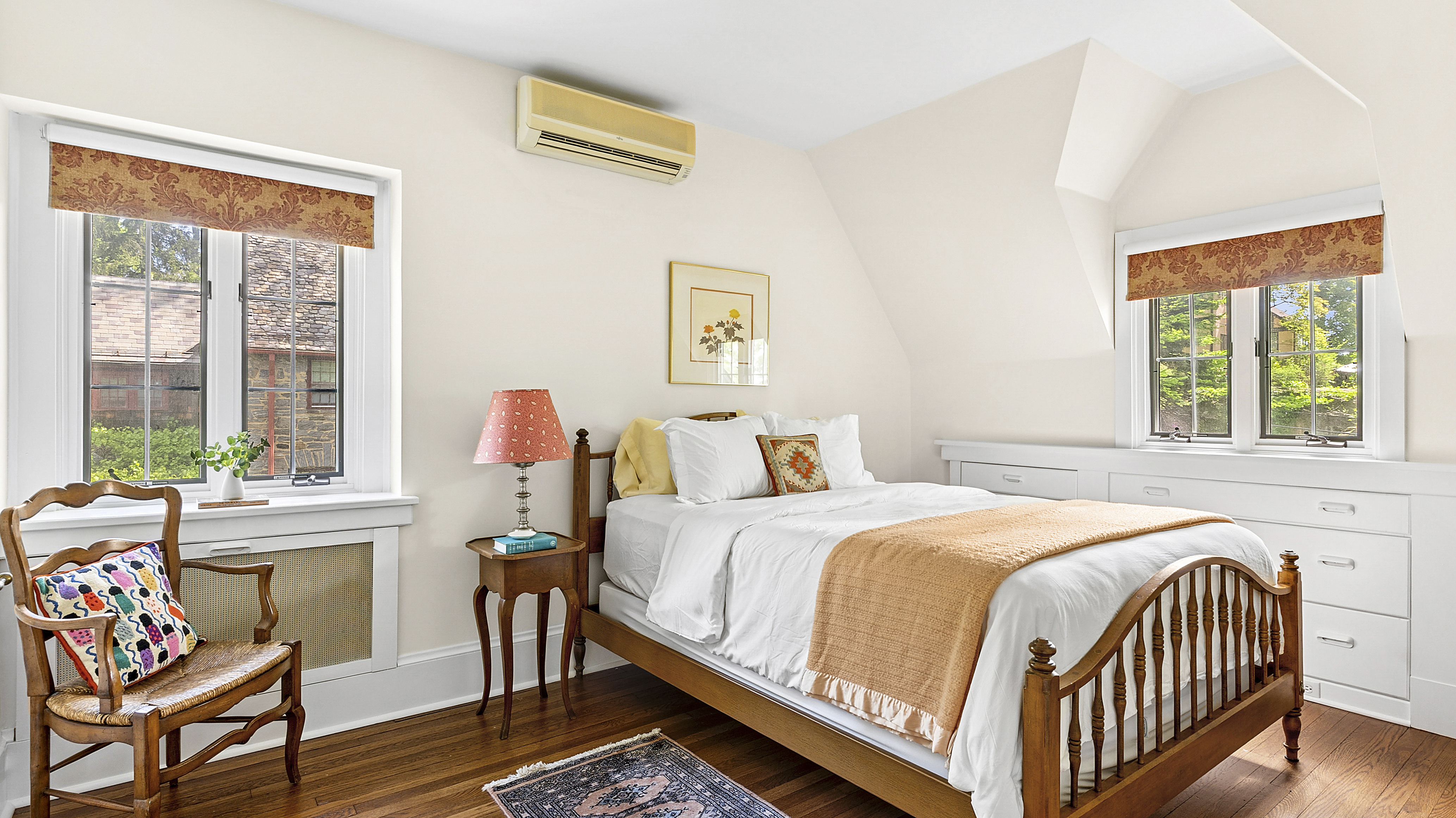 4417 Tibbett Avenue Bronx, NY 10471 - Photo 12 of 20 a bedroom with a bed and wooden floor