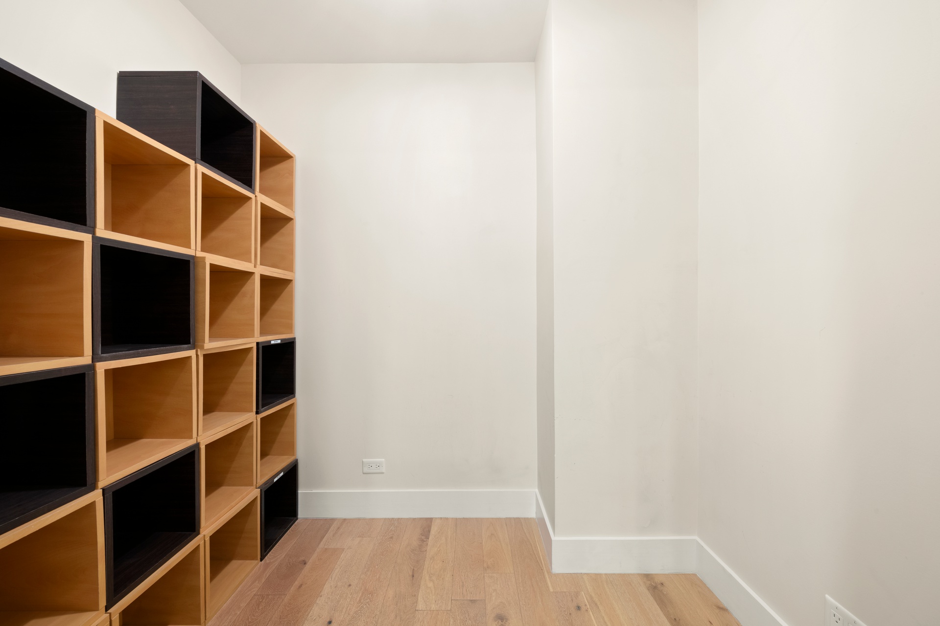 70 East 10th Street, Unit 4V Manhattan, NY 10003 - Photo 11 of 26 a view of walk in closet with empty racks
