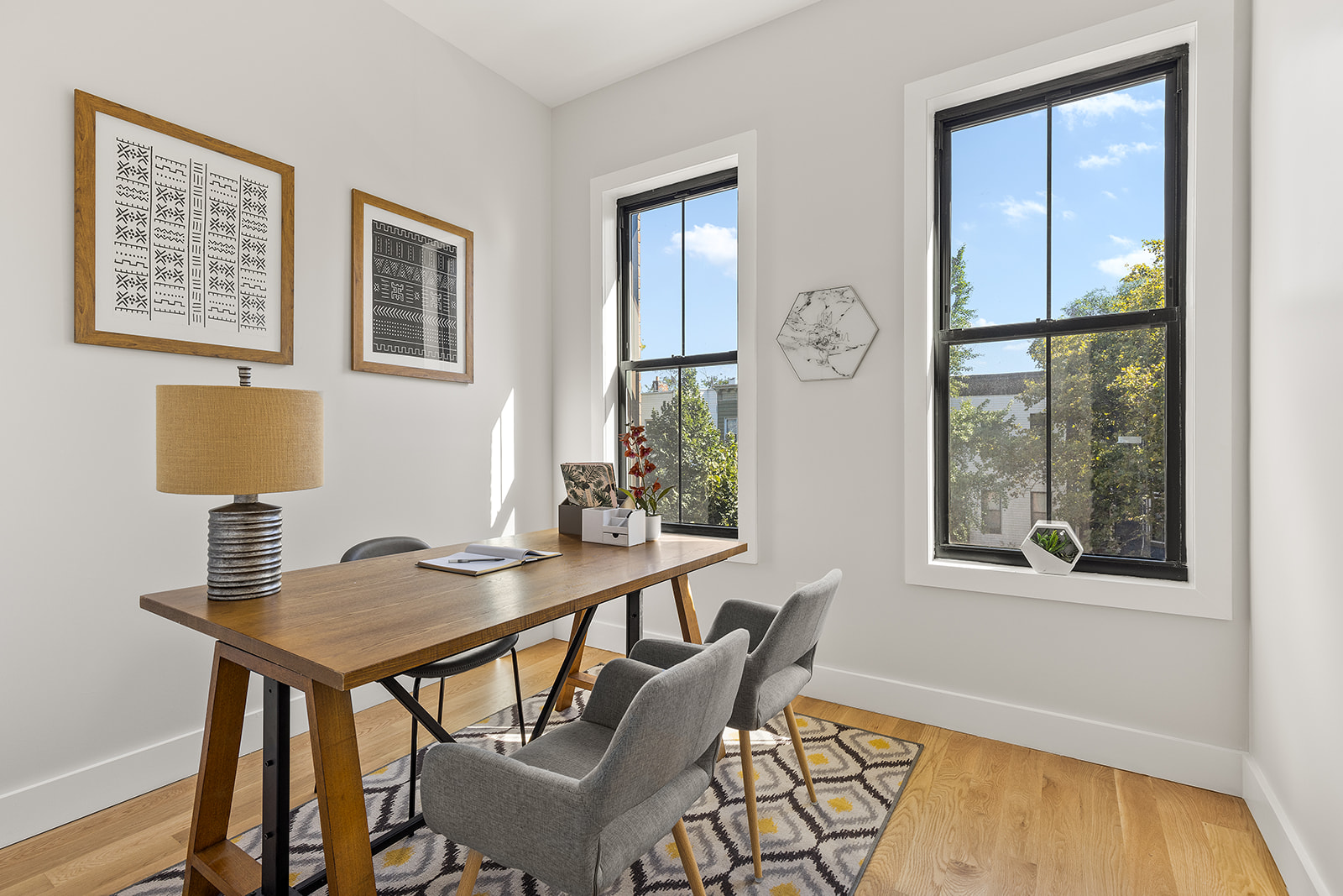 661 Decatur Street Brooklyn, NY 11233 - Photo 11 of 13 a view of a workspace with furniture and window