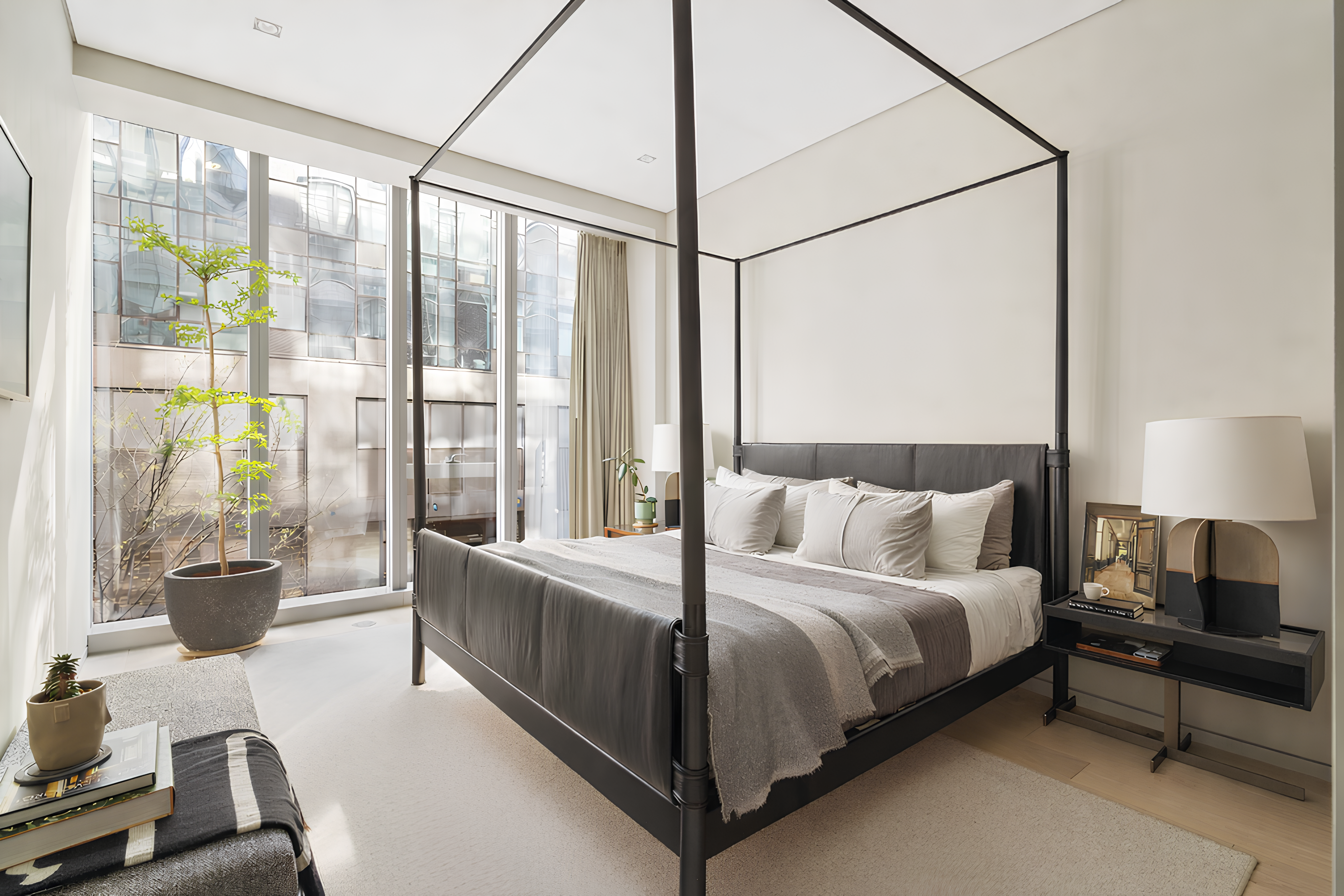 515 West 29th Street, Unit 2S Manhattan, NY 10001 - Photo 9 of 11 a bedroom with a bed and a large window