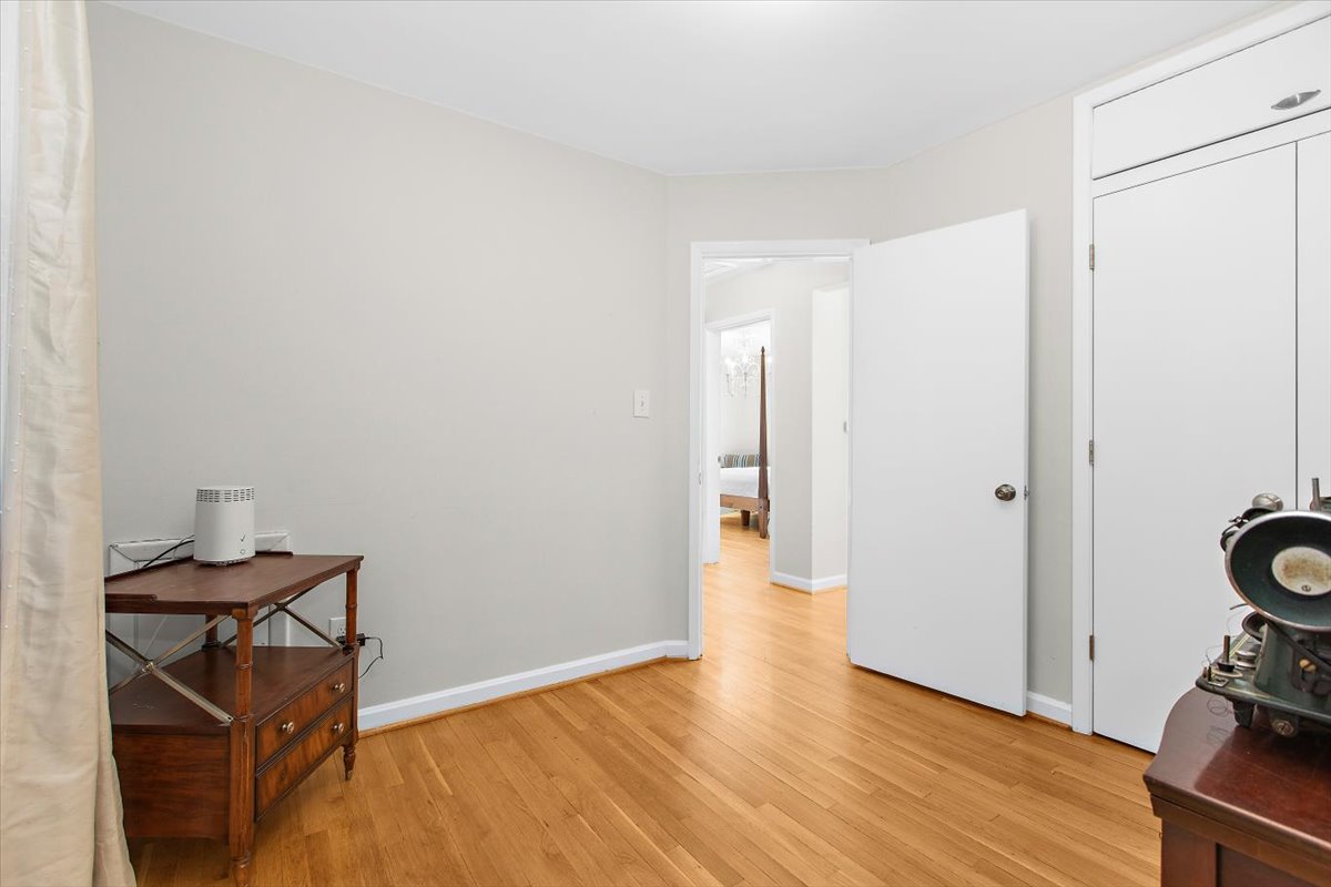 12712 Atherton Drive Silver Spring, MD 20906 - Photo 20 of 40 a view of a room with wooden floor and bathroom sink