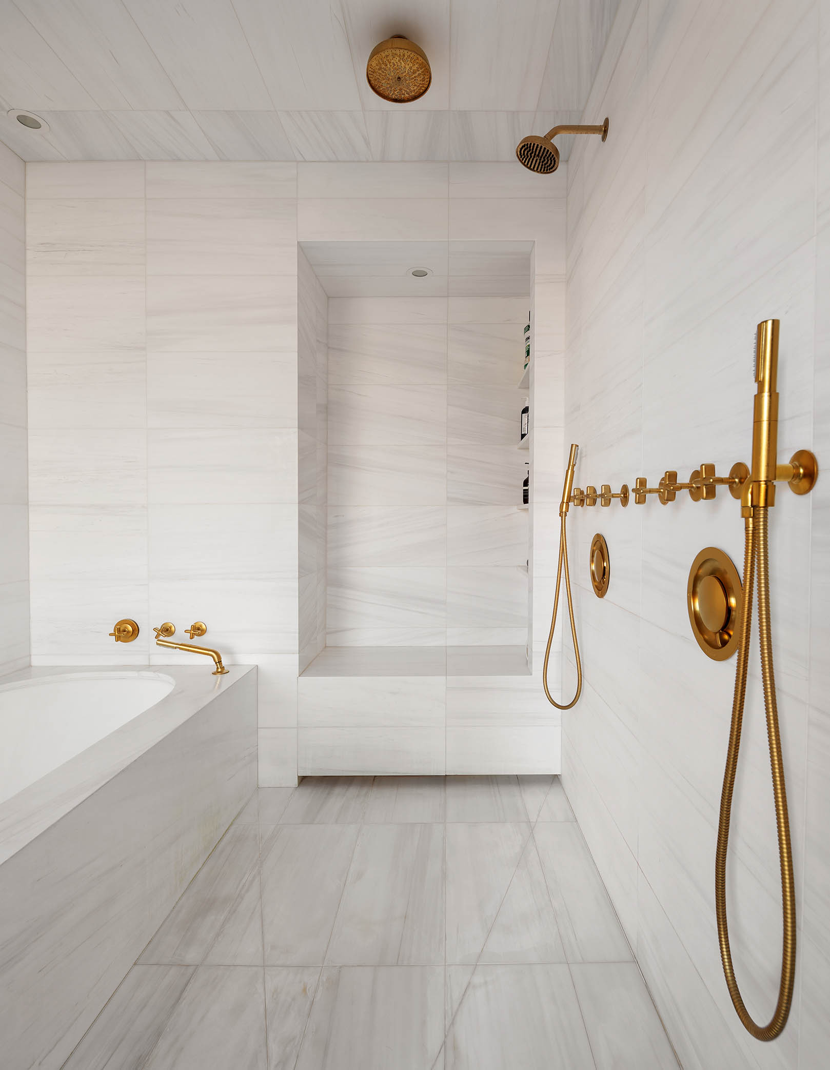 505 West 19th Street, Unit 8C Manhattan, NY 10011 - Photo 10 of 13 a bathroom with a bath tub with a shower