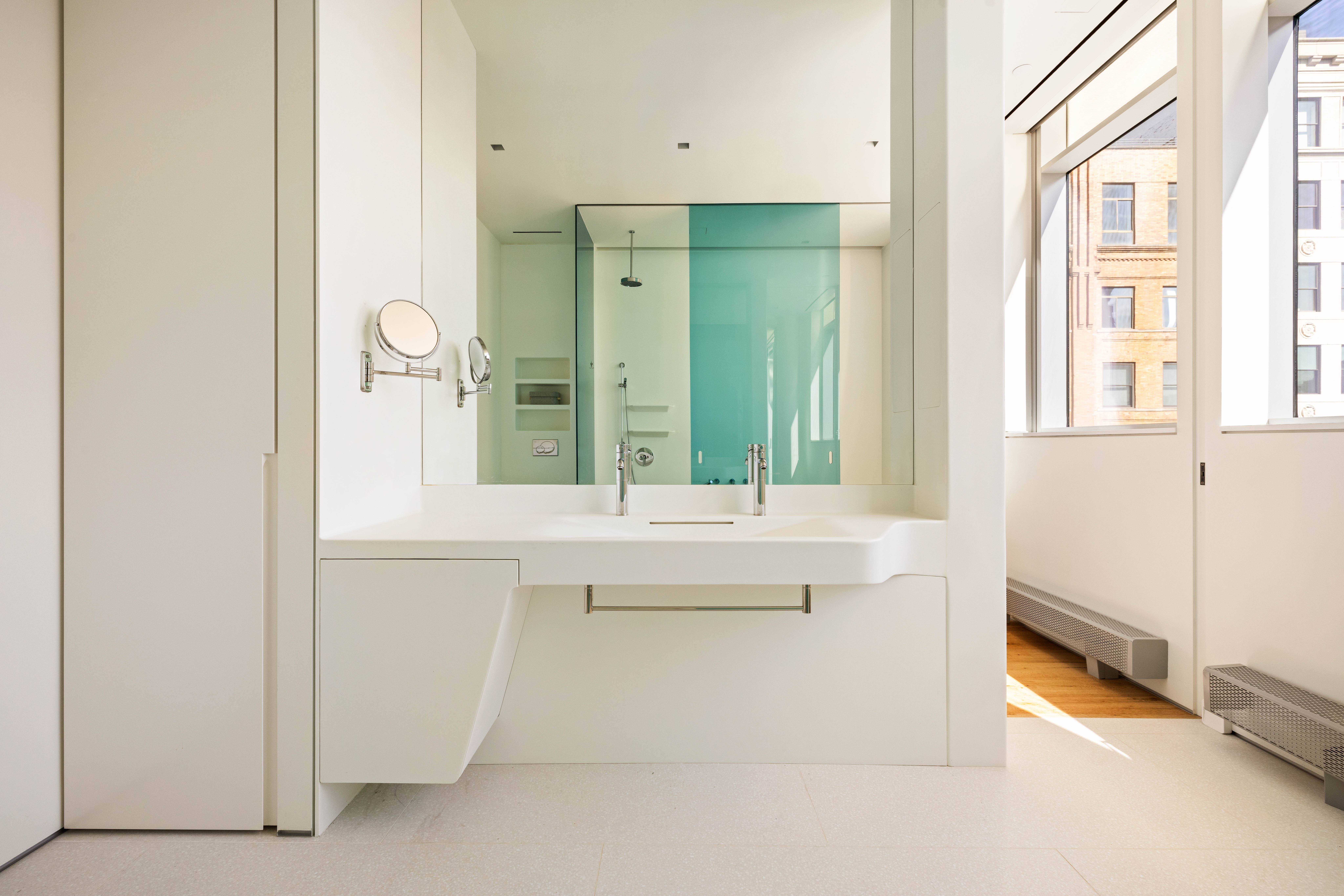 166 Perry Street, Unit 5A Manhattan, NY 10014 - Photo 11 of 25 a bathroom with a tub sink and mirror