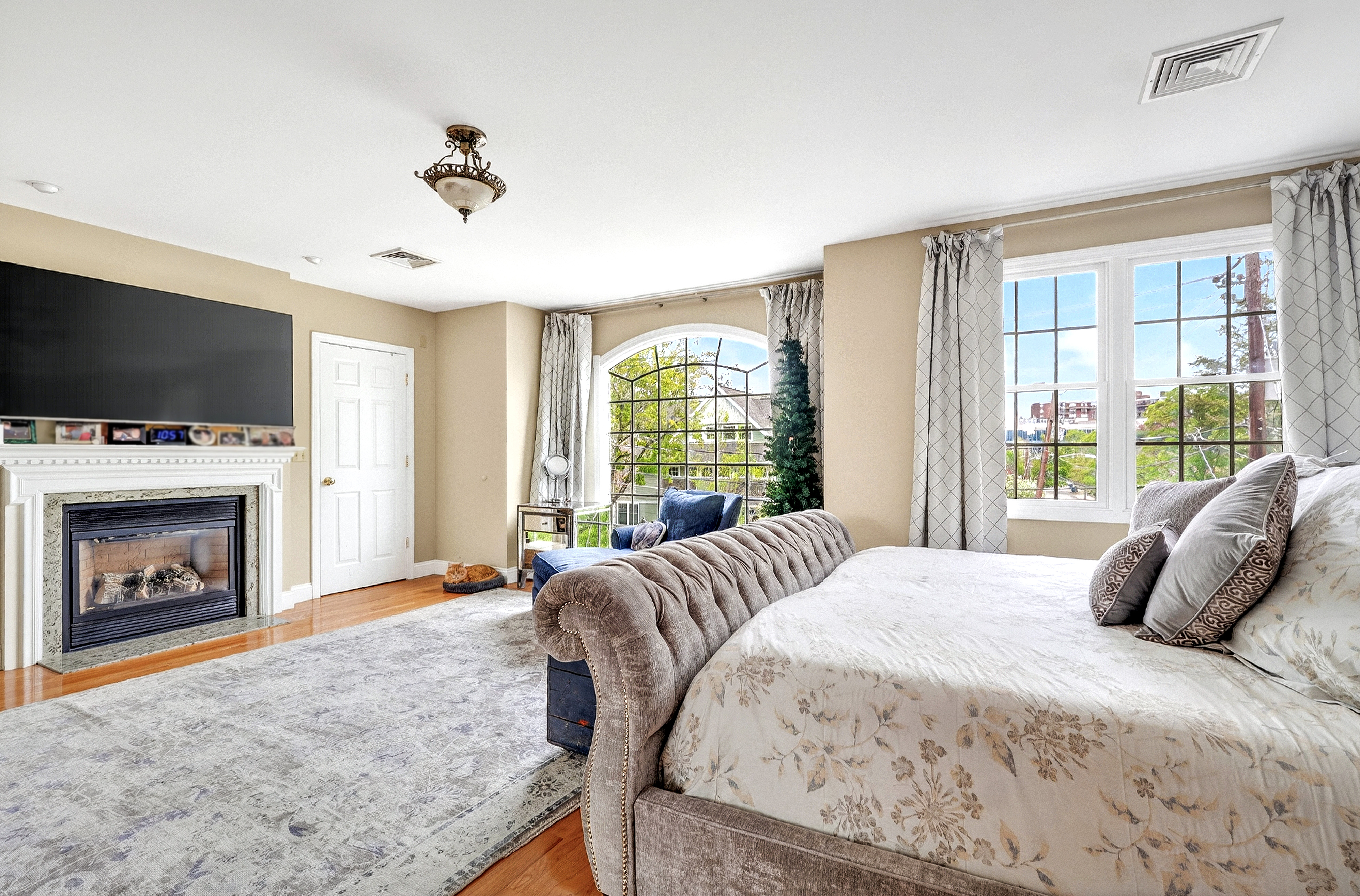 58 Tanglewood Road Newton Center, MA 02459 - Photo 20 of 33 a bedroom with a bed and a fireplace