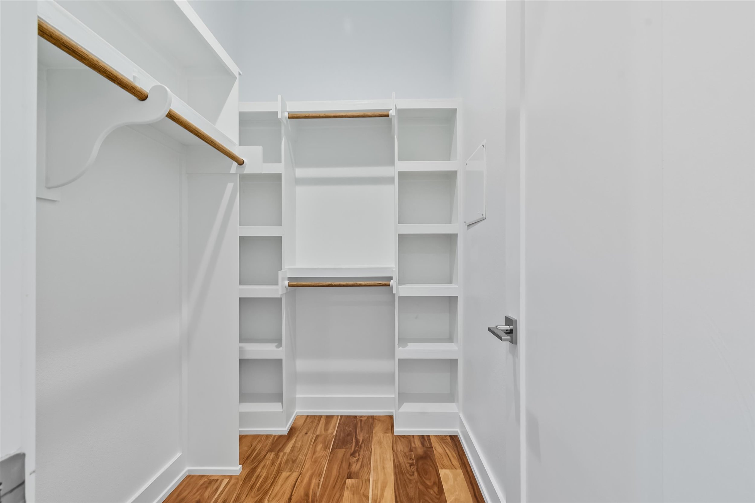 2712 Oak Springs Drive, Unit A Austin, TX 78702 - Photo 11 of 26 a view of walk in closet with empty racks