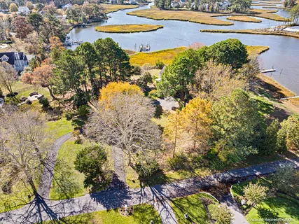 an aerial view of a residential building with outdoor space
