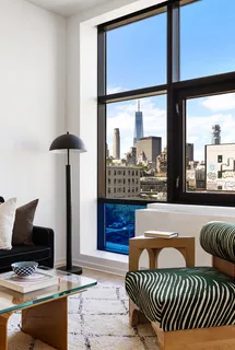 a view of a city with tall buildings