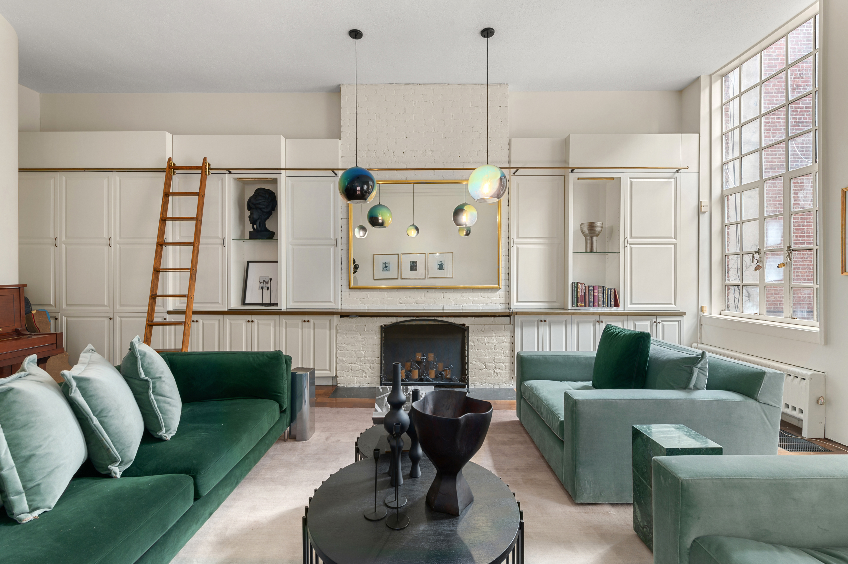 126 West 78th Street Manhattan, NY 10024 - Photo 3 of 39 a living room with furniture and a fireplace