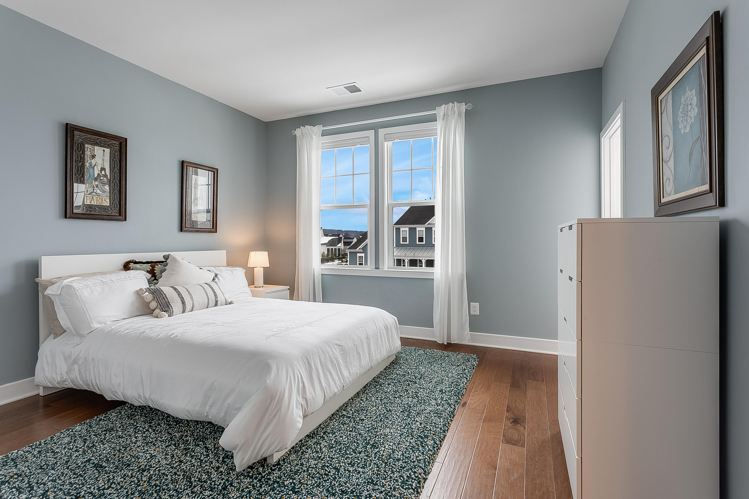 1011 Justinian Street Leesburg, VA 20175 - Photo 38 of 56 a bedroom with a large bed and a window